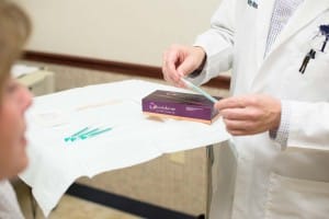 Doctor with Juvederm needle