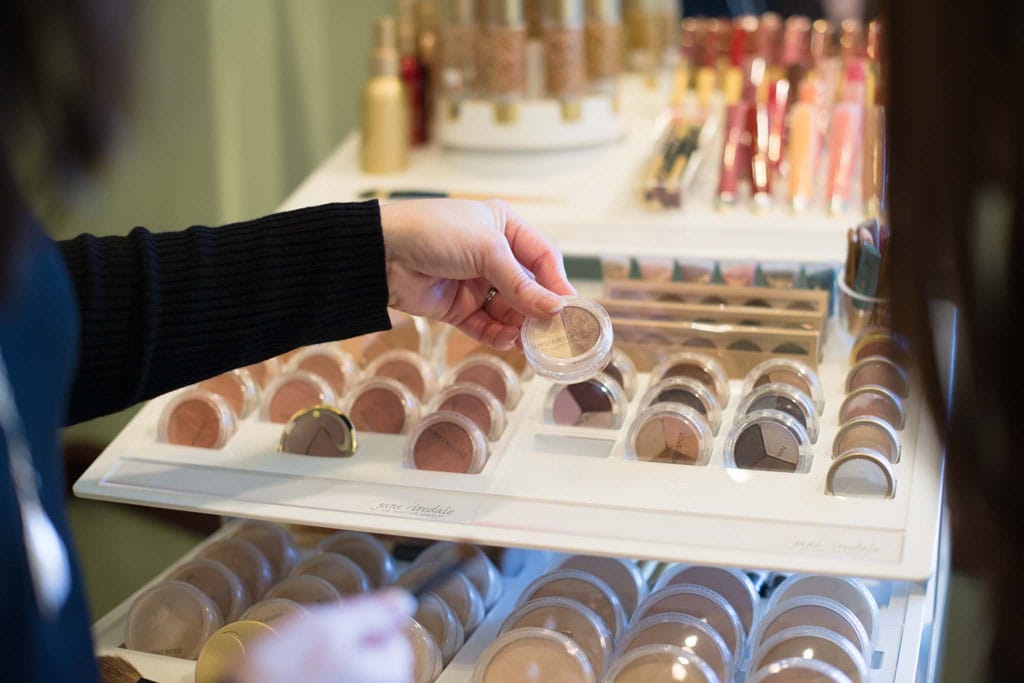 Hand holding single beauty product