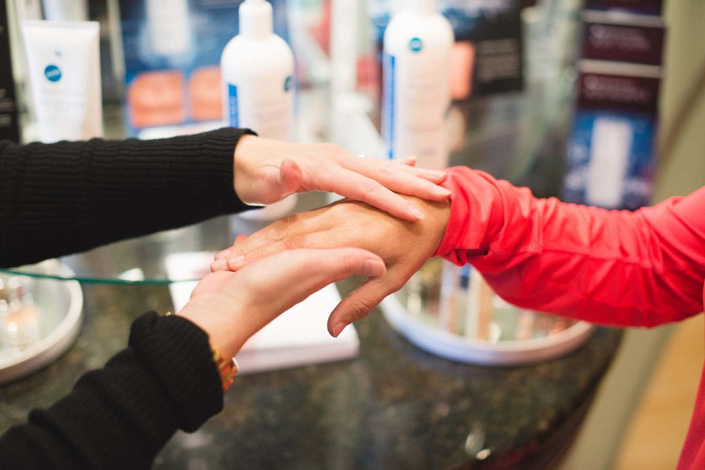 Hand caressing other hand