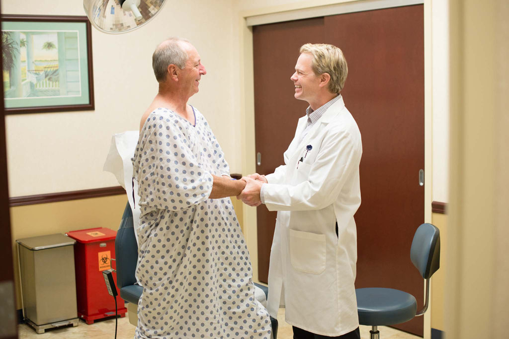 Doctor & Patient shaking hands upon completion of visit